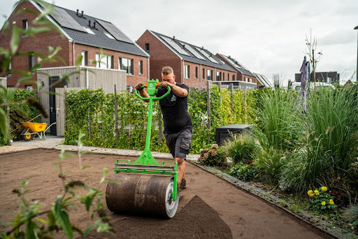 Combineer een grasveld met een moestuin of bloementuin